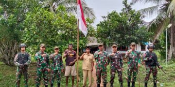 Secara Serentak, Satgas Pamtas RI-PNG Statis Yonif 511/DY Kibarkan Bendera Merah Putih di Papua