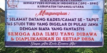 DPC SPRI Taput Bentang Spanduk Sambut Kedatangan Studi Tiru Kades/Camat Se-Taput
