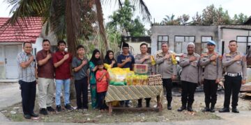 Kapolres Labuhan Batu Salurkan Bantuan kepada Keluarga Korban Junaidi Marpaung