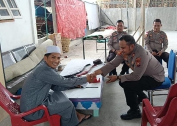 Polsek Panipahan Gelar Bakti Sosial Peringati 1 Muharram 1447 H, Salurkan Bantuan ke Warga Kurang Mampu
