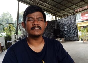 Erwin, Tiga Bulan Mengais Rezeki dari Pekerjaan Sehari-hari di Pasar Cisarua