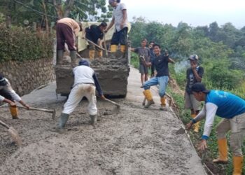 Pemdes Sukaharja Realisasikan Bantuan Keuangan Infrastruktur untuk Betonisasi Jalan dan Rehabilitasi Kantor Desa