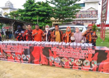 Taem Pratama Pimpin Langsung Kegiatan Sosial di Bagan Batu, Ratusan Paket Dibagikan kepada Pengguna Jalan